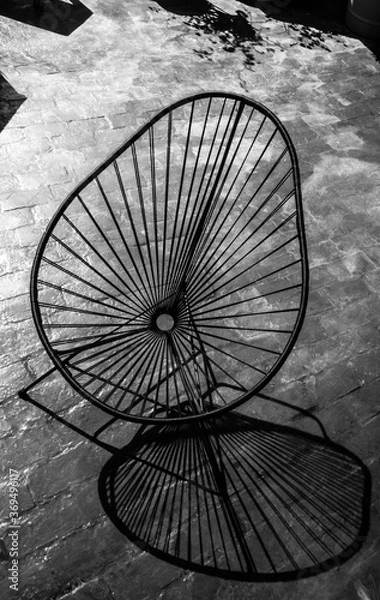 Obraz Chaise acapulco et ombres sur terrasse