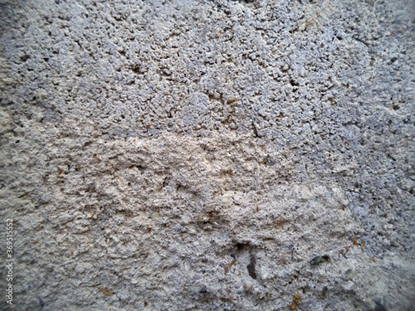 Fototapeta Background of stone chips. Pattern of light gray stone. The texture of the stone. 