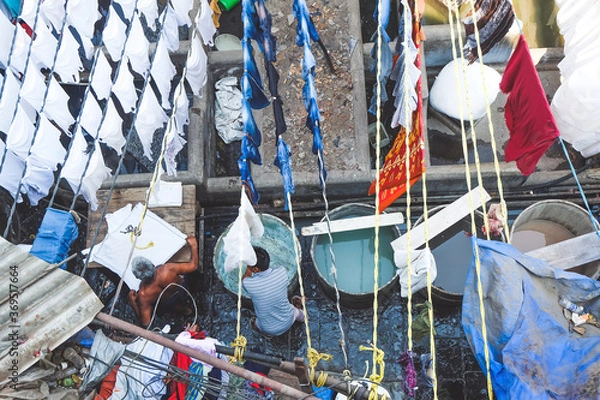 Fototapeta MUMBAI, MAHARASTRA, INDIA- MARCH 2020 : Dhobi Ghat (Mahalaxmi Dhobi Ghat) is a biggest open air laundry in Mumbai, India. This place is one of famous landmark and tourist attraction of Mumbai.