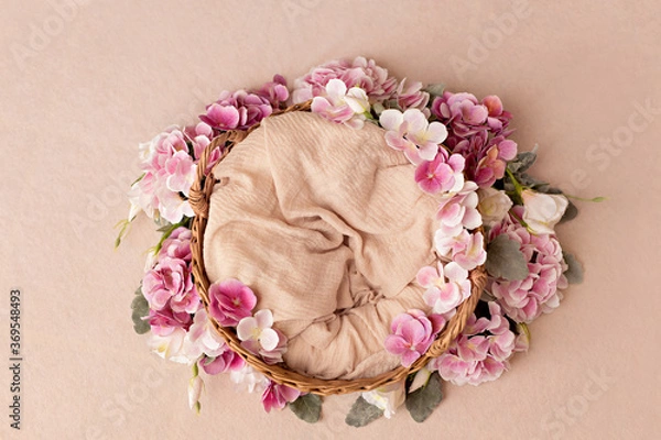 Obraz Wicker basket with summer pink hydrangea flowers. Copy space