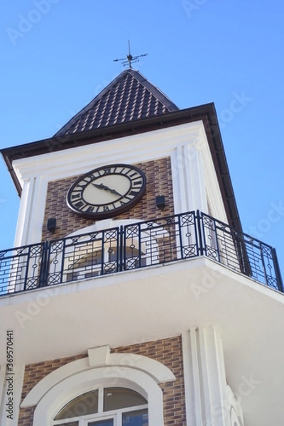 Obraz The clock tower isolated on blue sky