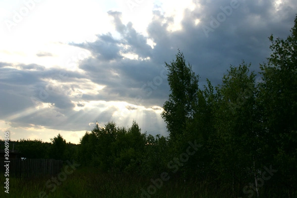 Obraz rays of the sun through the clouds