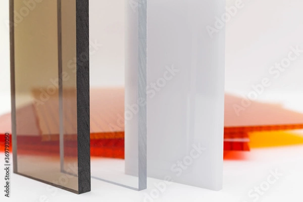 Obraz Solid Polycarbonate Sheet. Brown and transparent. Acrylic Plastic glass. Colored pc sheet on background