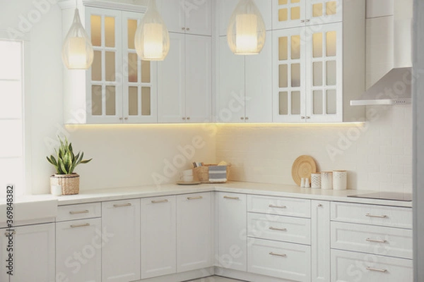 Fototapeta Beautiful kitchen interior with new stylish furniture