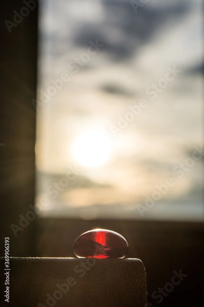 Fototapeta Red stone standing before the sunrise