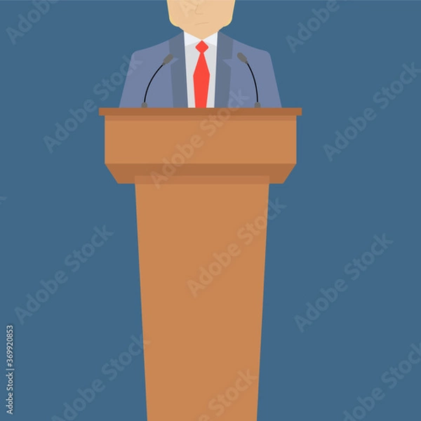 Fototapeta a man stands in front of a podium and talks or debates
