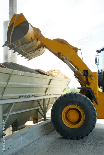 Obraz Wheel loader excavator at construction site
