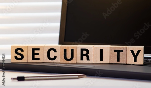 Fototapeta Security word on wooden cube blocks on white grey glossy background