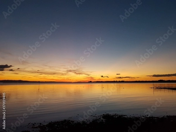 Obraz sunset over the river