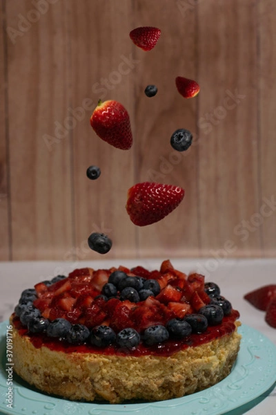 Obraz strawberry and blueberry cheese cake with  fruit
