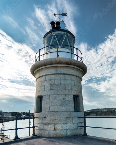 Fototapeta Folkestone / England - August 07 2020: Restored Lighthouse, Folkestone Harbour Arm.