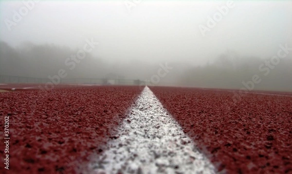 Obraz white line on red track.