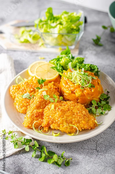 Fototapeta Crispy schnitzel with cornflakes