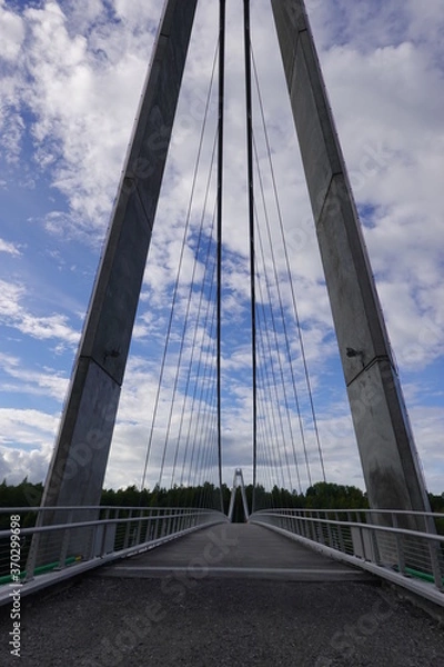 Fototapeta perspective with a bridge with cloud sky
