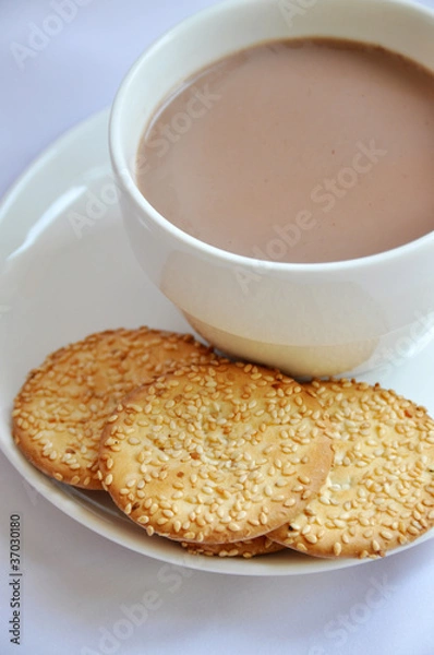 Obraz biscuit with cup of coffee and cream