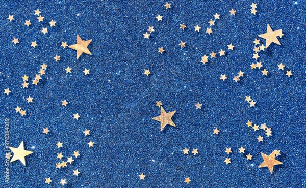 Obraz Background of gold stars on colored paper with sequins