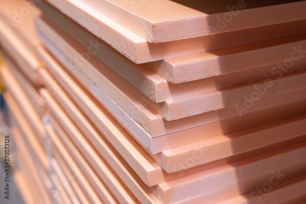 Fototapeta Pink insulation folded neatly in the store