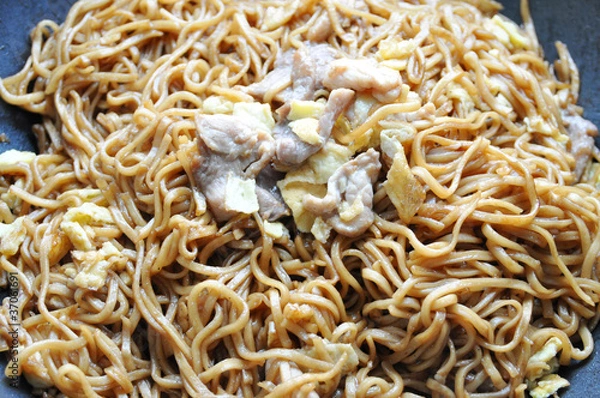 Obraz image of fried noodles on the pan