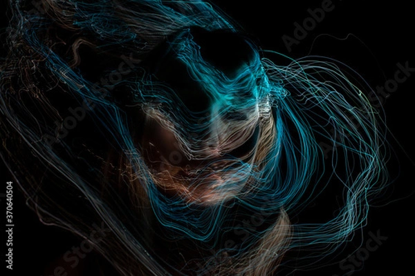Obraz light painting  erotic portrait, light drawing at long exposure, abstract colorful background 
