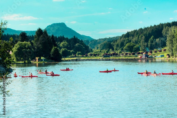 Fototapeta canoes on the background of mountains