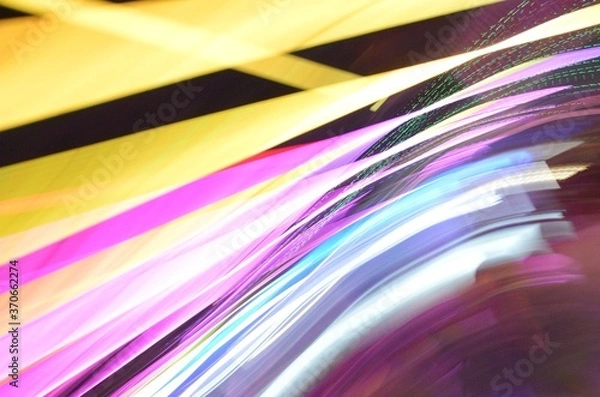 Obraz Long exposure photo of color LED and Neon lights with camera motion and dark background