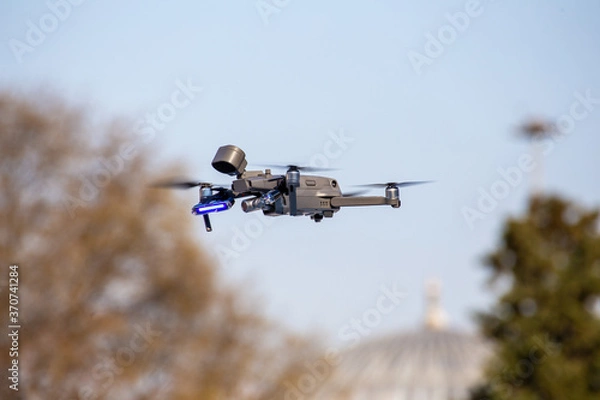 Fototapeta Flying drone with a thermal temperature measuring camera