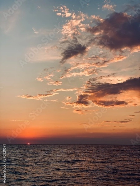 Fototapeta sunset over the ocean