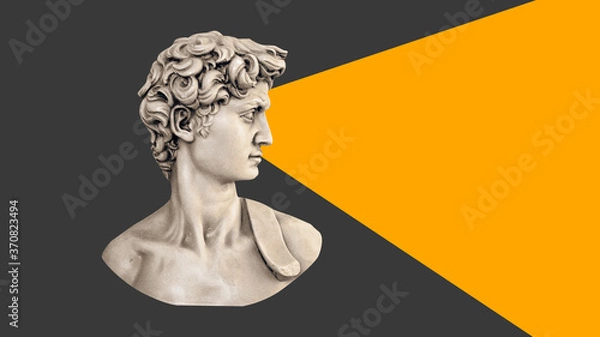 Obraz Head of an antique statue on a gray background with an orange triangle in front