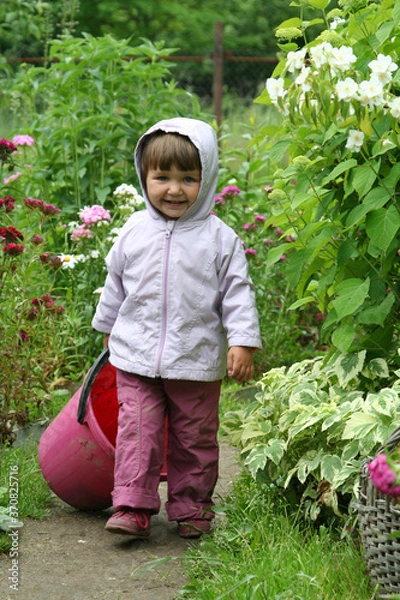 Obraz a child runs with a bucket