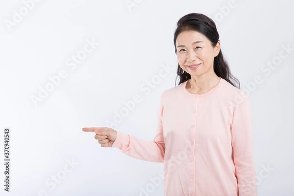 Fototapeta 指差しをする女性