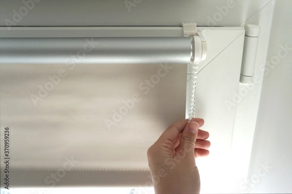 Obraz blackout roller blinds on the window