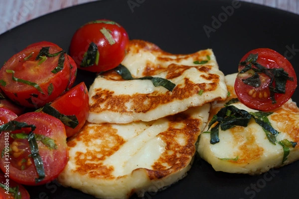 Obraz Grilled halloumi cheese with cherry tomatoes