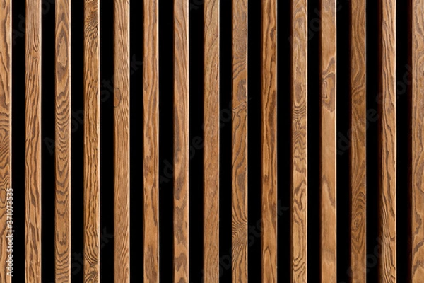Fototapeta Texture of wood lath wall background. Seamless pattern of modern wall paneling with vertical wooden slats for background