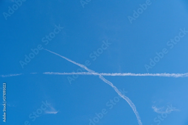 Obraz 青空と交差する飛行機雲