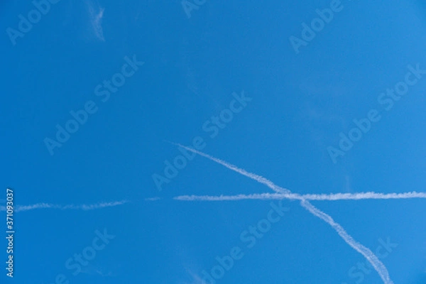 Obraz 青空と交差する飛行機雲