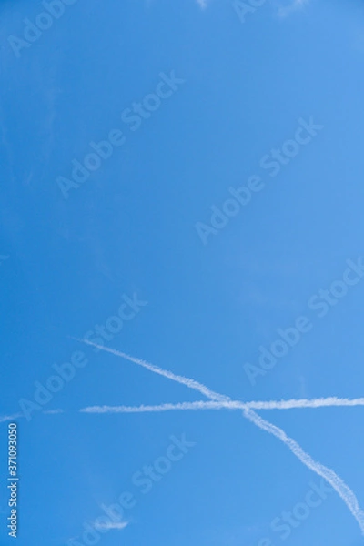 Obraz 青空と交差する飛行機雲