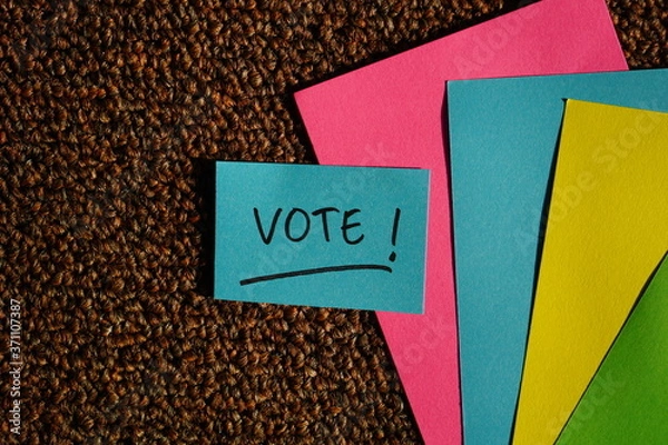 Fototapeta vote text for election day on text conceptual in hand writing style. Democracy politic background concepts campaign celebration.