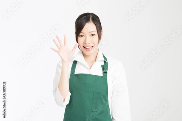 Fototapeta 接客する女性店員