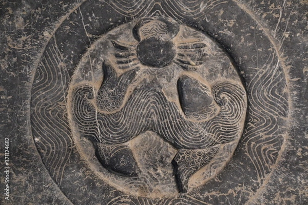 Obraz Ancient Chinese Garden stone depicting engraved zodiac signs such as cancer and pisces Chinese horoscope