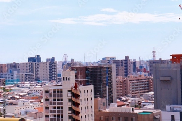 Fototapeta 道後公園展望台から中心地の観覧車方面を眺める