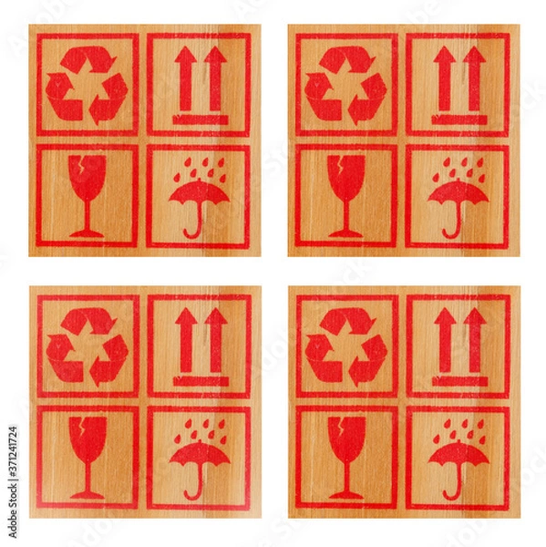 Fototapeta Signs and symbols for the carriage of baggage and cargo on wooden background