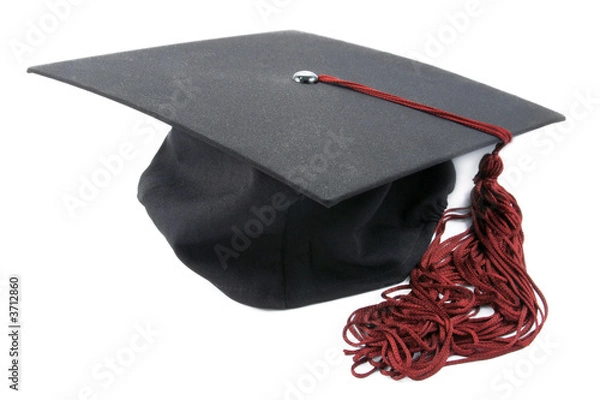 Fototapeta graduation cap with a red tassel isolated on white