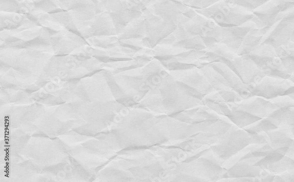 Fototapeta Closeup crumpled grunge grey paper  texture background. Light grey paper sheet with space for text ,pattern or abstract background.
