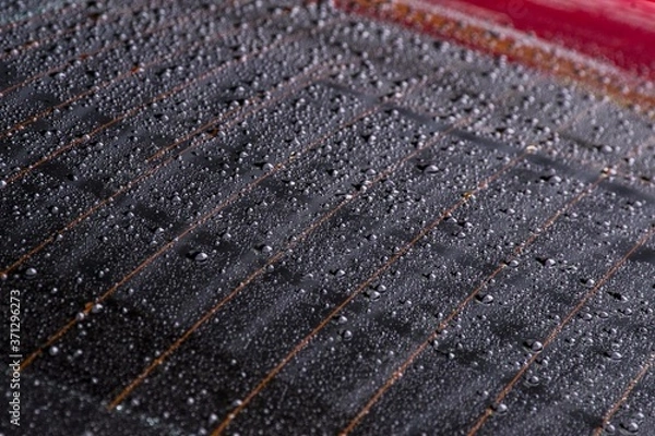 Obraz Water drops on the rear window of the car