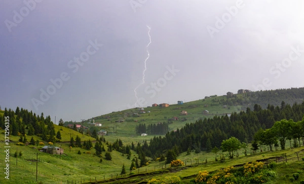 Obraz lightning over the mountains