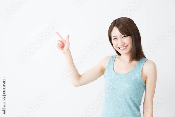 Fototapeta 指差しをする女性