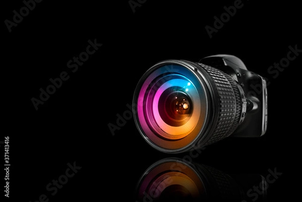 Fototapeta Professional digital camera with lens attached.