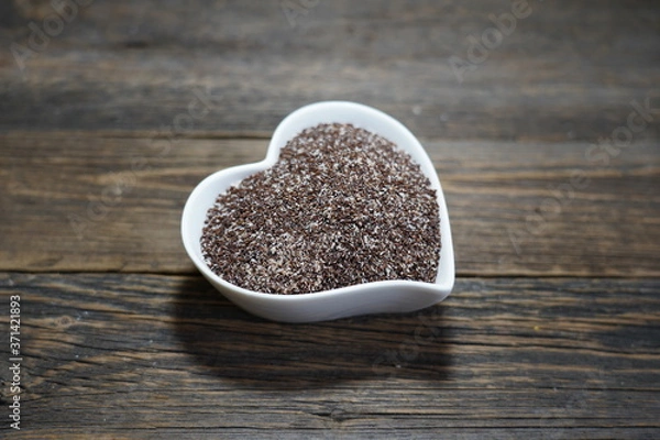 Fototapeta Mix of Plantago afra L. (Plantago psyllium) seeds and Plantago ovata (blond psyllium) husks, widely used as a dietary fiber.