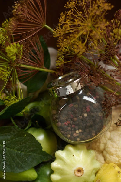 Fototapeta Jar with peppercorns Close-up on wooden background