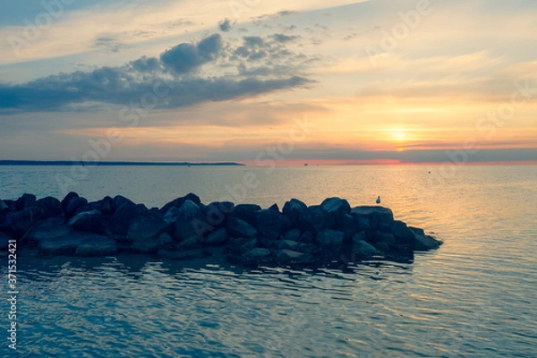 Fototapeta view sunset on the beach of the city of Helsingborg, Sweden
